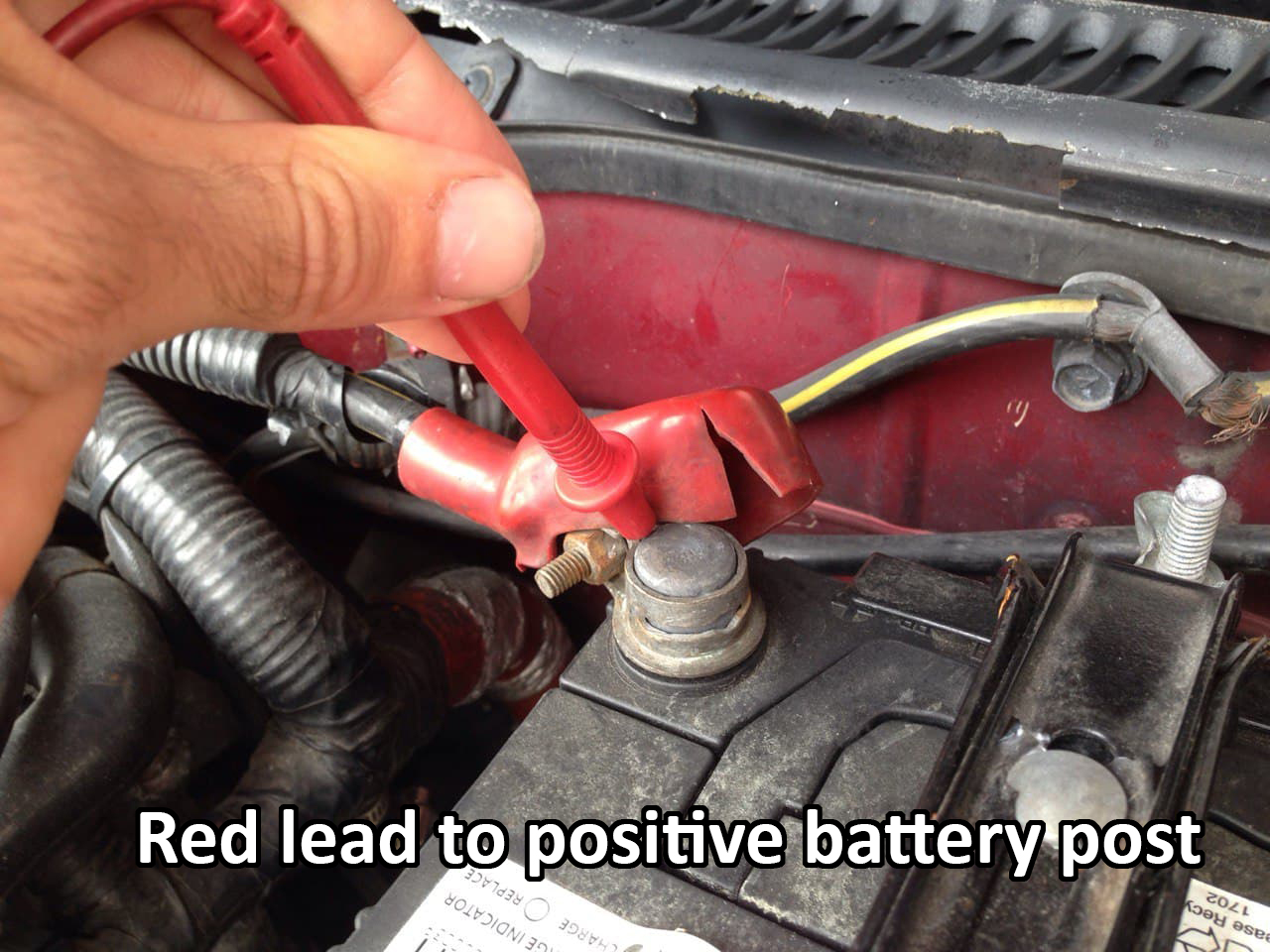 Placing positive lead on positive battery post